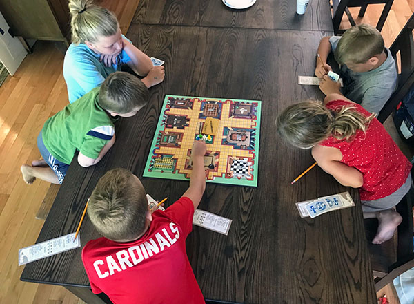 playing board games with our kids