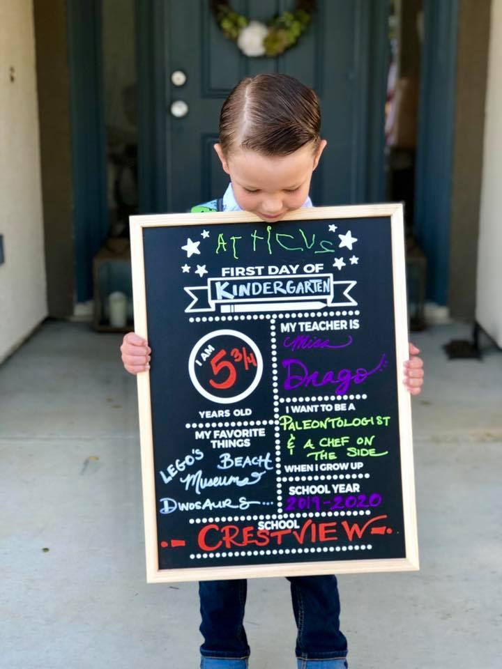 back to school pictures with reusable chalkboard sign