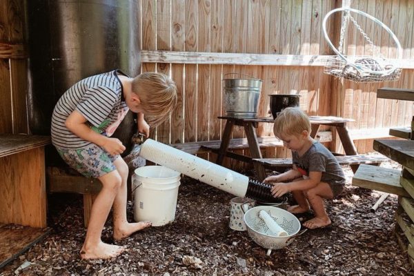 a mud kitchen offers so many opportunities for creative play curatedplayspaces.com