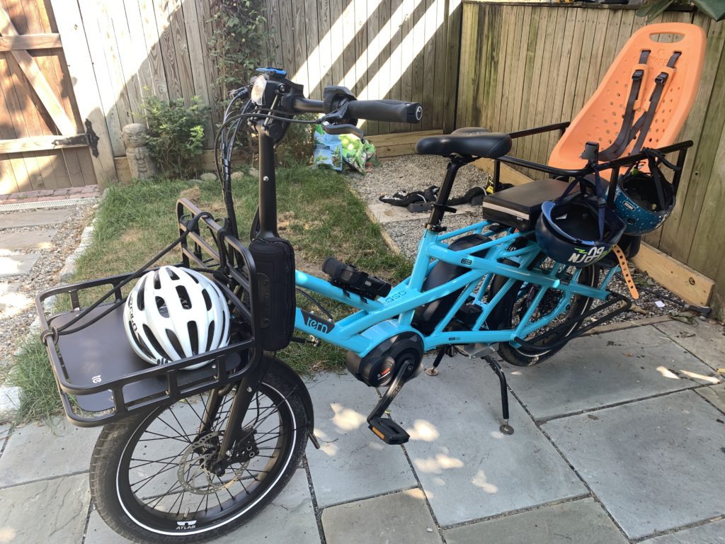 The Tern Cargo bike lest moms commute wiht kids on back and bags on front