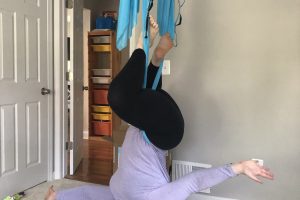 mommy having fun indoor aerial yoga